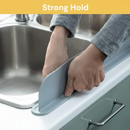 Flexible silicone faucet splash guard for kitchen and bathroom sinks, helping reduce water splashes and keeping countertops neat, dry, and organized.