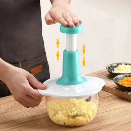 Manual vegetable chopper for slicing and chopping onions, tomatoes, garlic, herbs, and fresh vegetables quickly. Space-saving kitchen essential available at Glinzay Official.